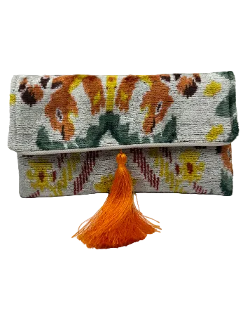 White Ikat Print Clutch with Orange Tassel